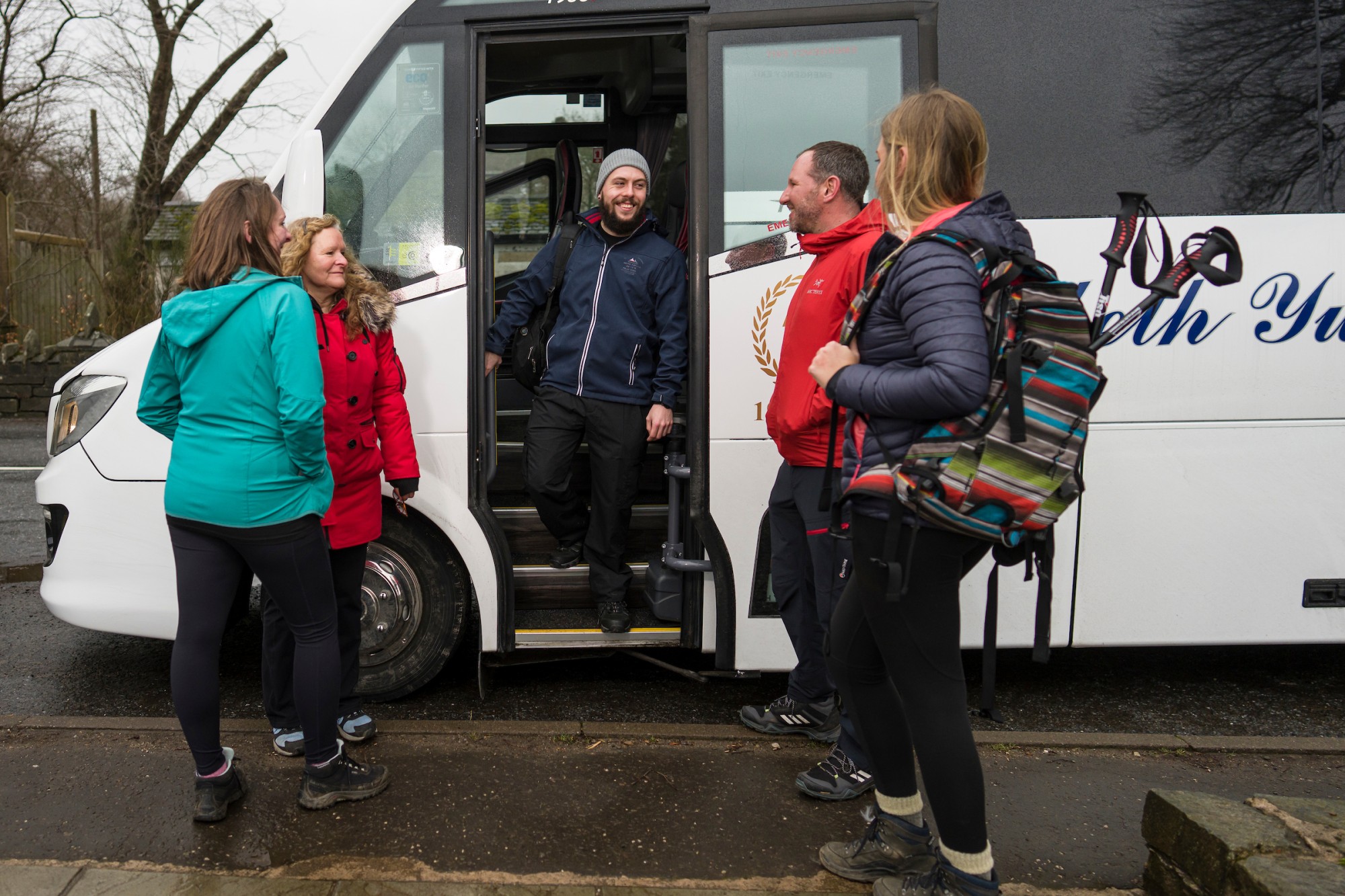 LI5 YUL coach, part of Yules fleet, leaving Kirkmichael heading over Moulin moor